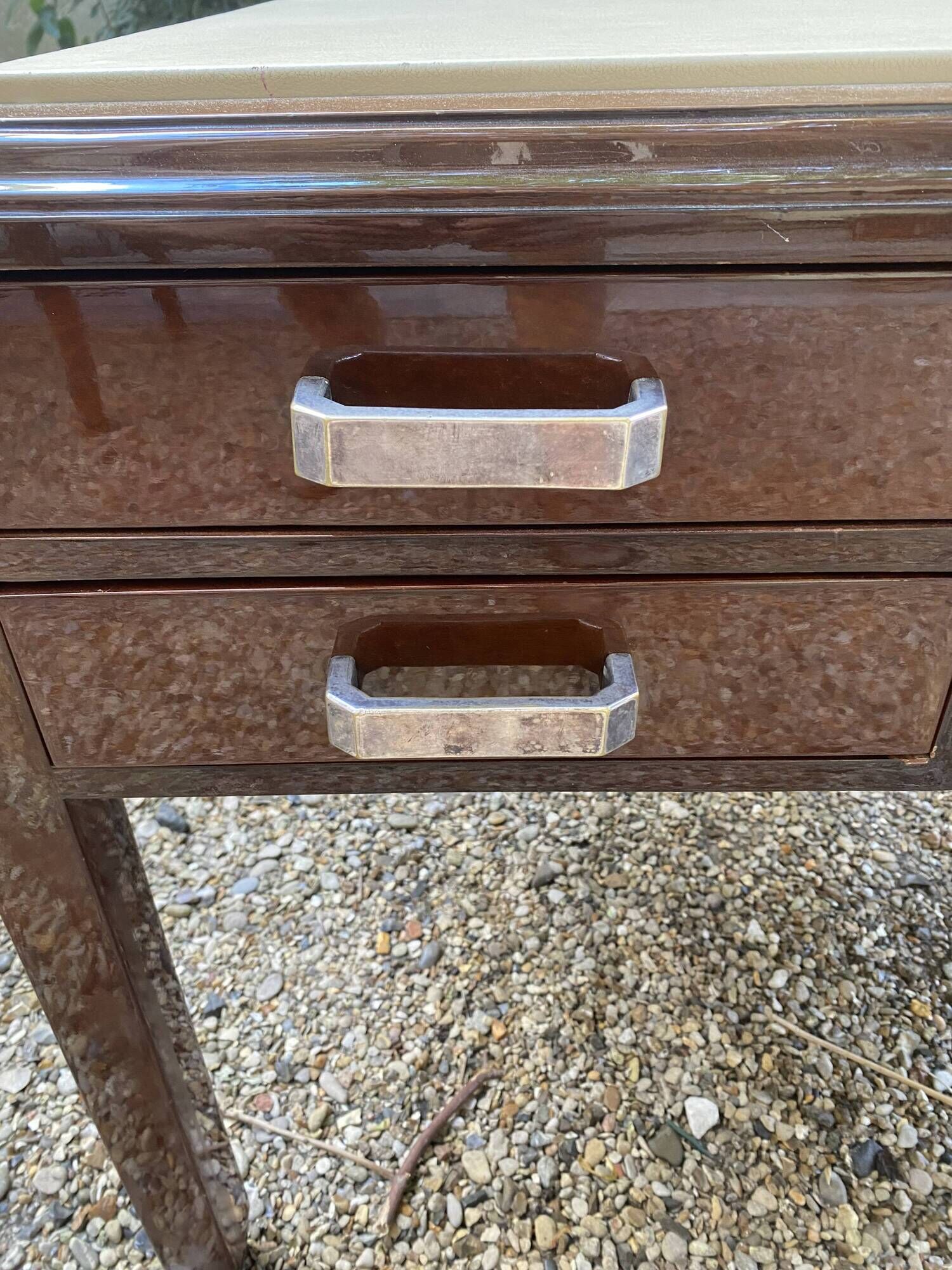 Art Deco desk in varnished mahogany.