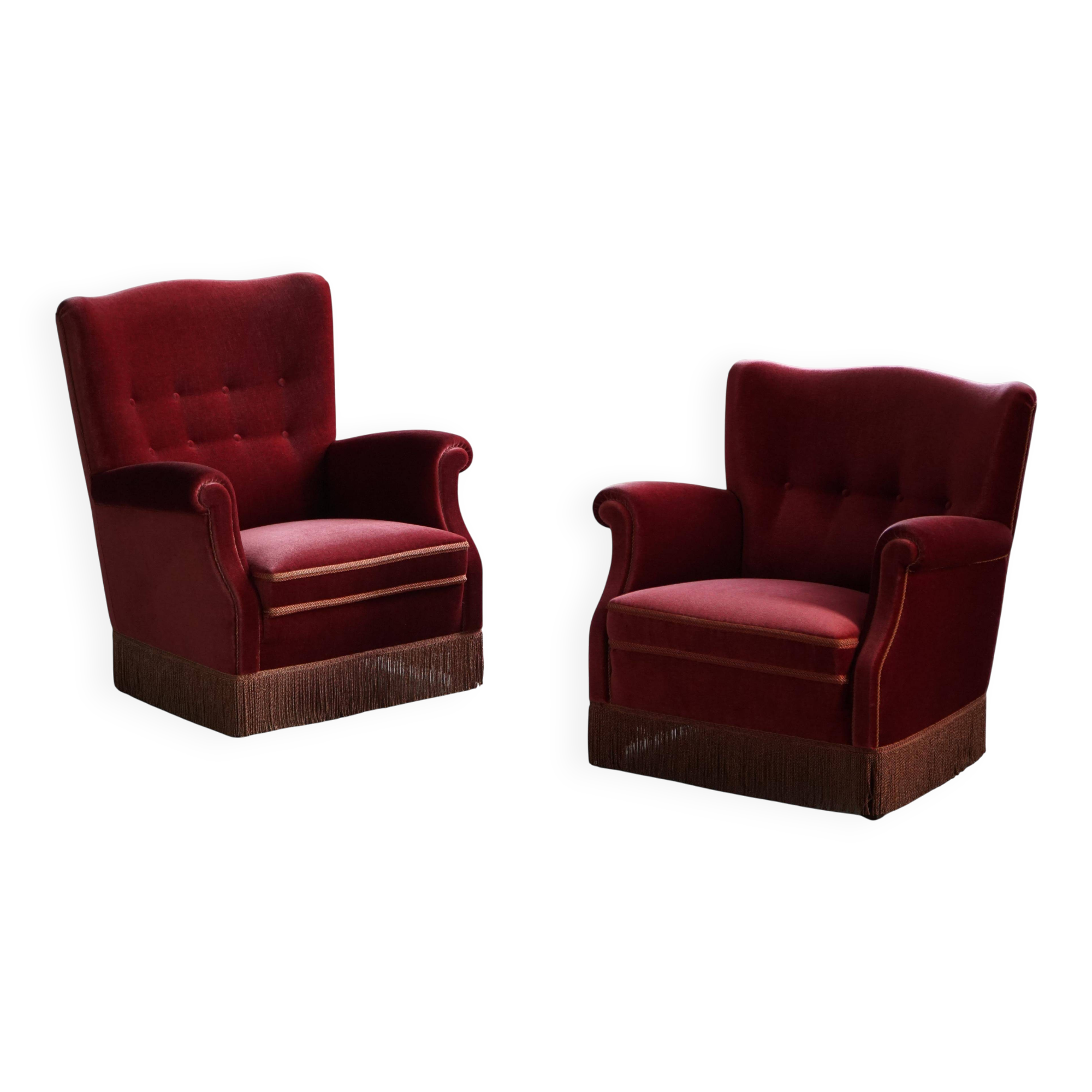 Pair of modern Danish lounge chairs, cherry red velvet, 1950s.