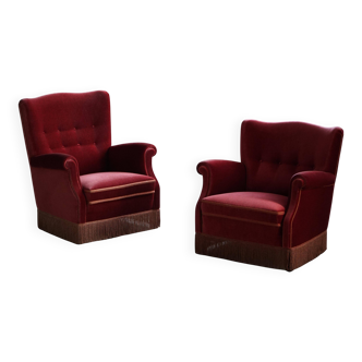 Pair of modern Danish lounge chairs, cherry red velvet, 1950s.