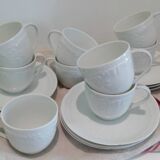 Set of 9 white porcelain coffee cups