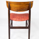 Ensemble de quatre chaises de salle à manger en palissandre et rembourré de tissu rouge, de design danois, années 1960