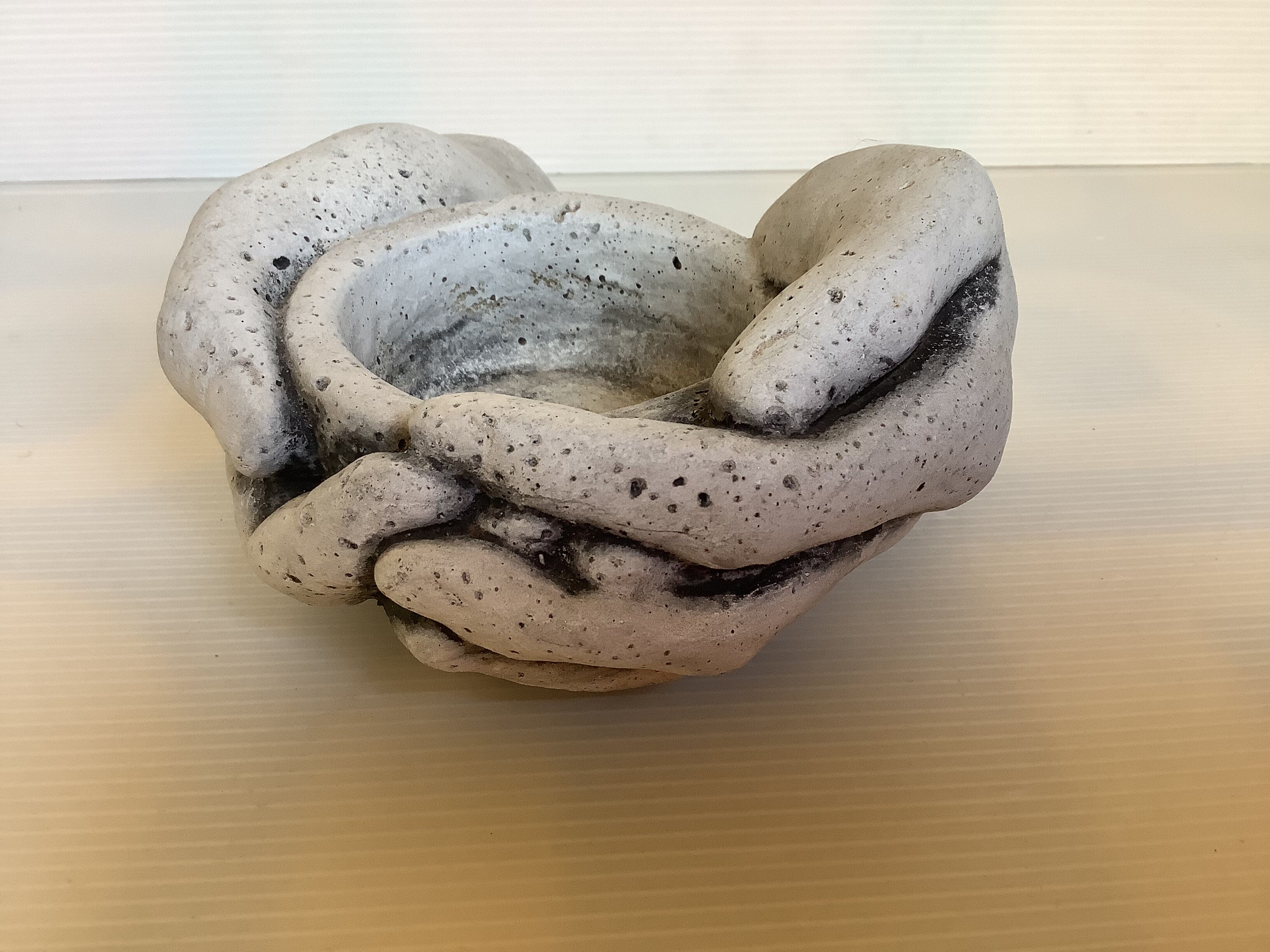 Hand candle holder gray black stone