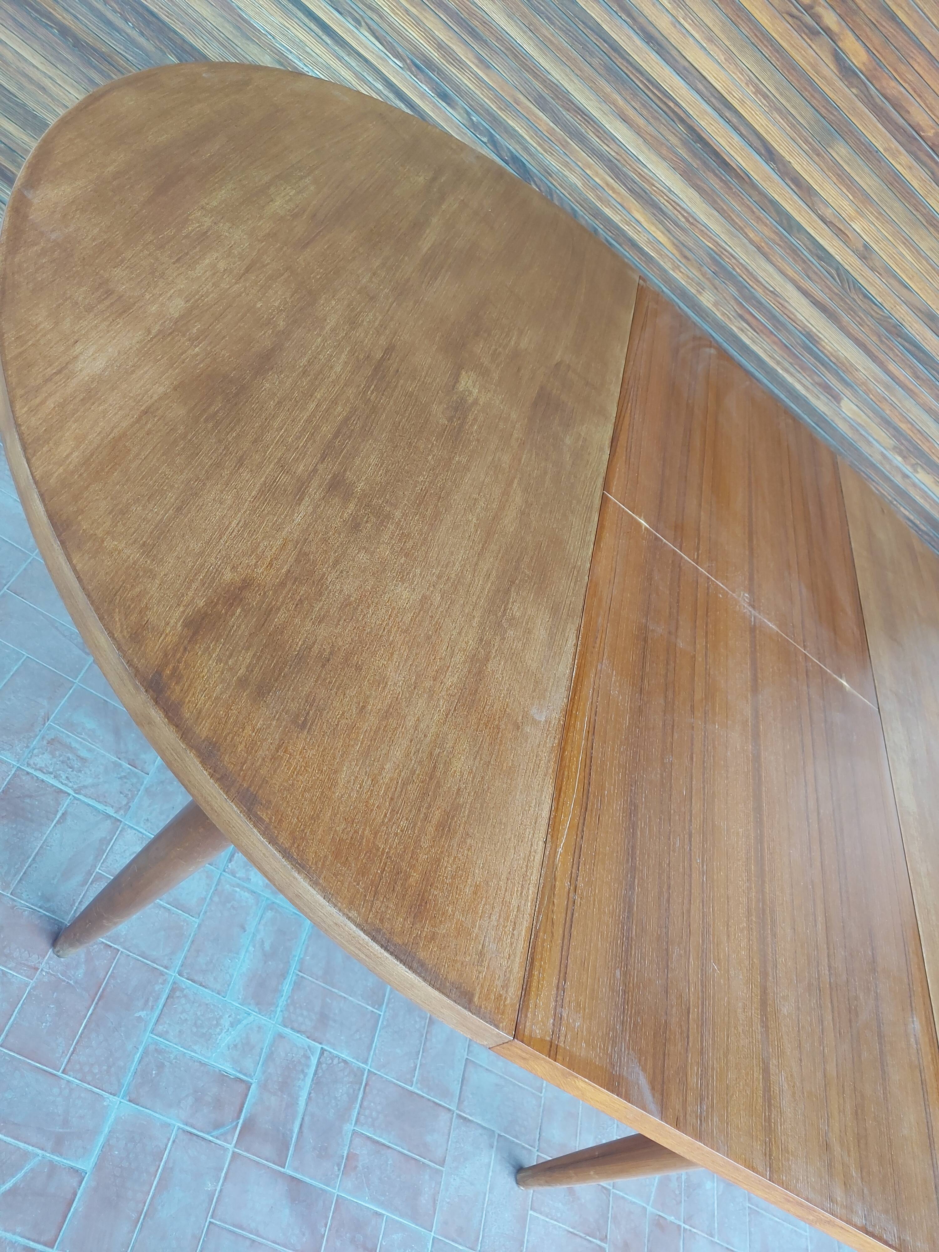 Scandinavian design teak table with extension cord