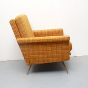 1950s chair in corn yellow , legs in brass