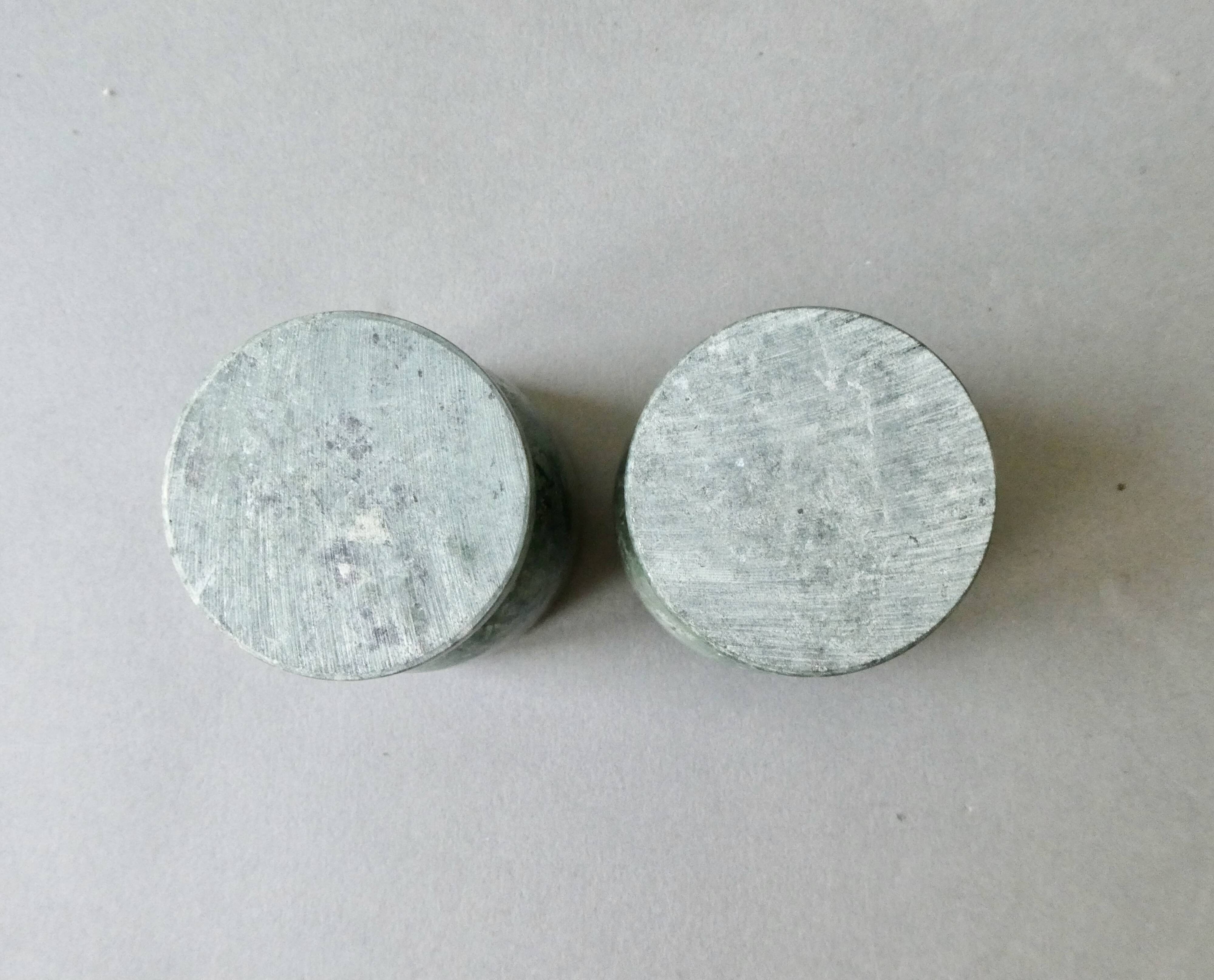 2 marble egg cups in veined white and green, circa 1980.