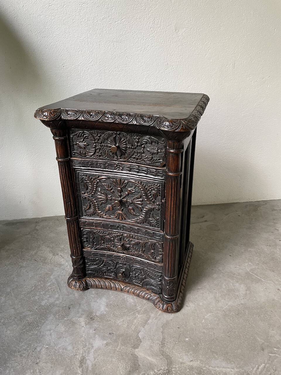 19th century chest of drawers in carved blackened pine