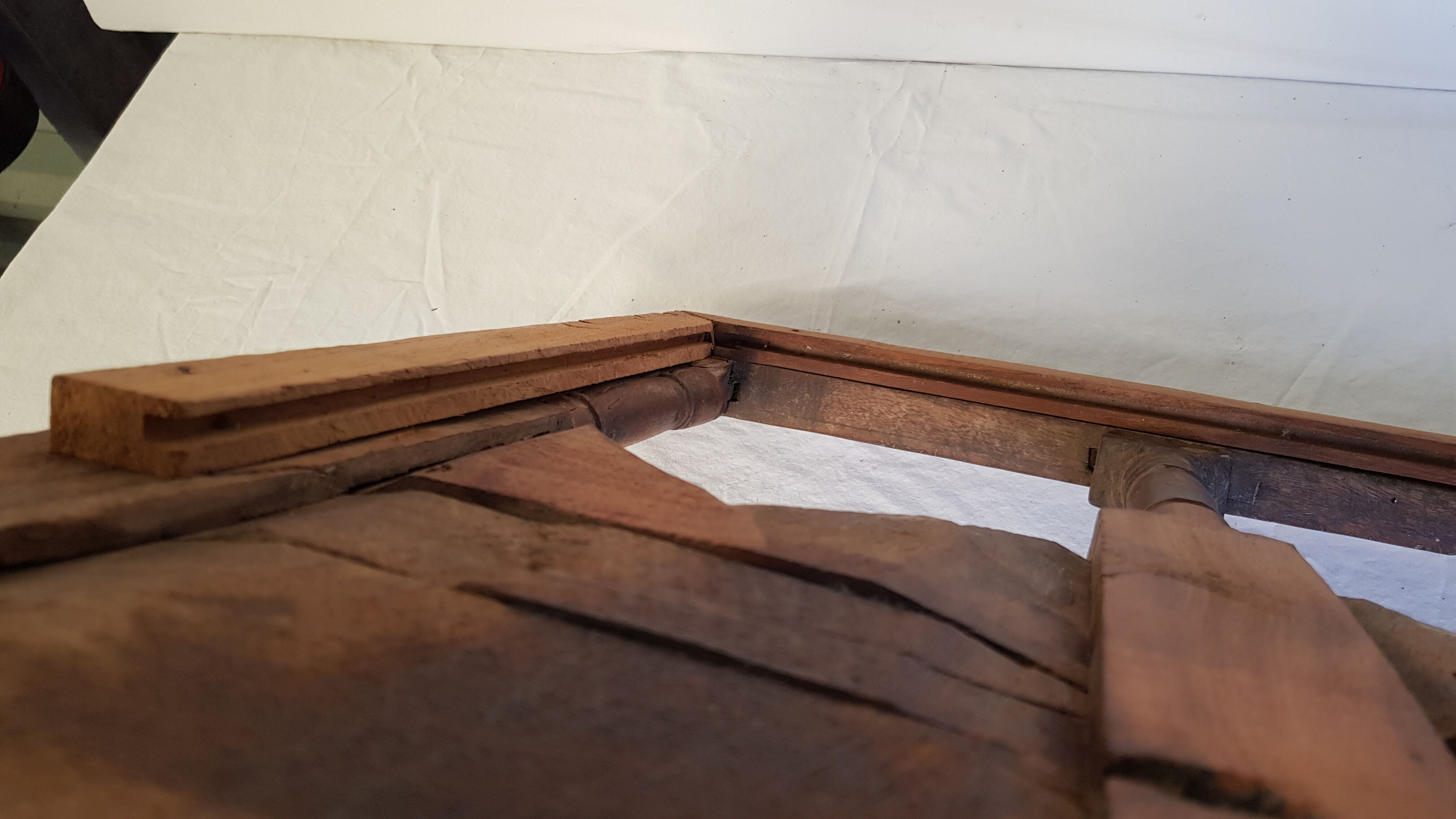 Carved wooden window with rear support for possible mirror