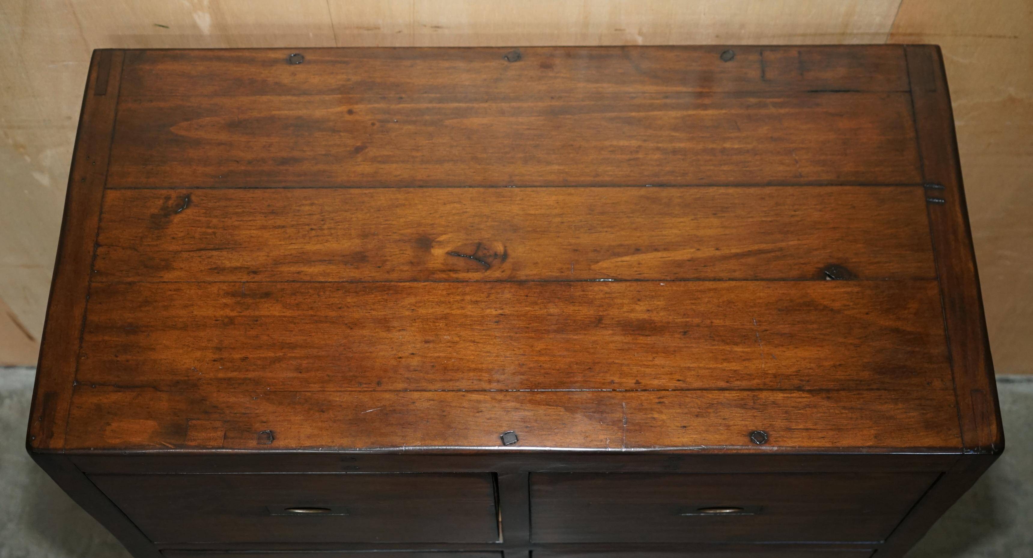 Large vintage hardwood furniture in military country style.