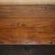 Large vintage hardwood furniture in military country style.