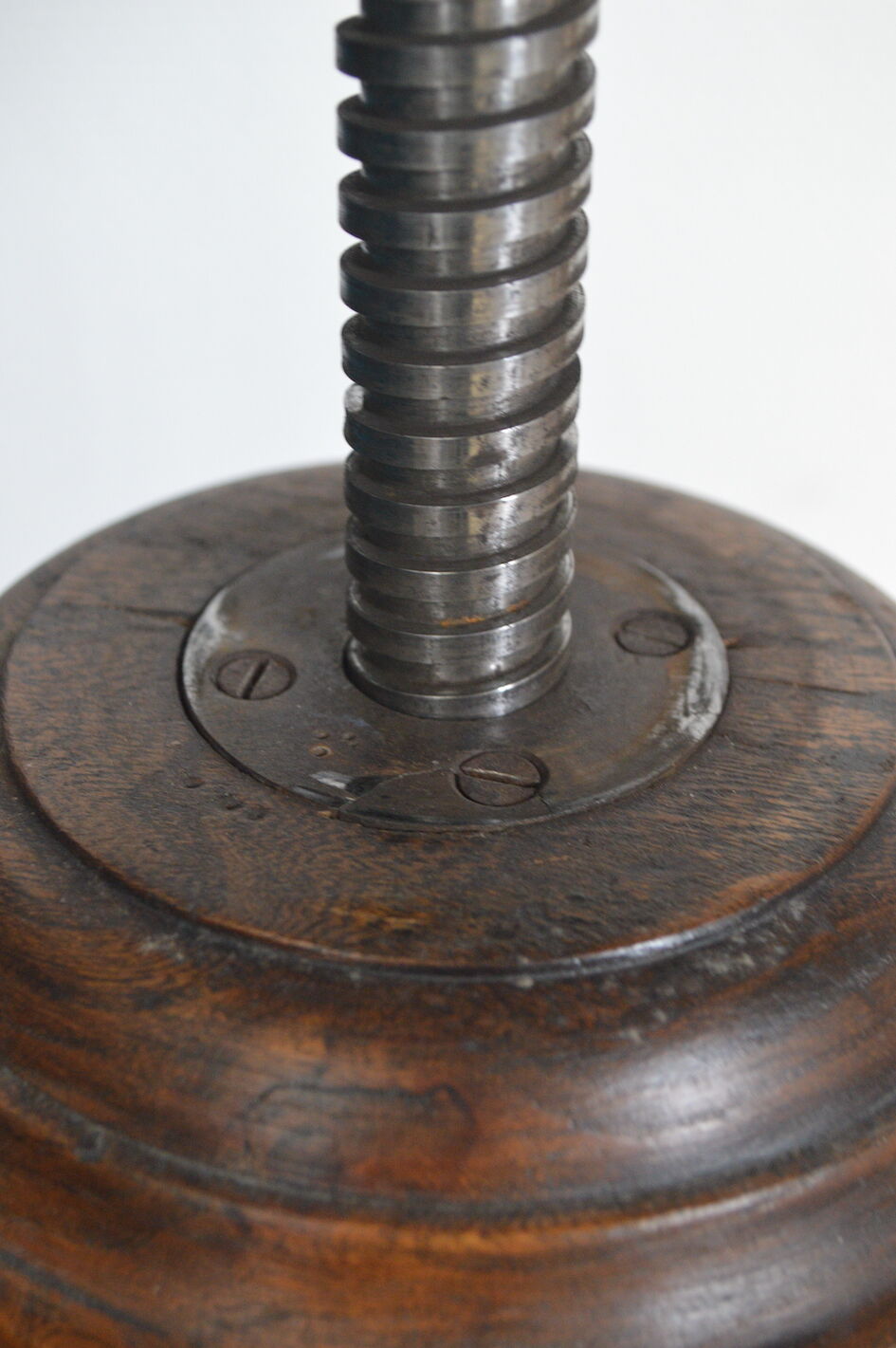 Antique piano stool with adjustable screws and turned wooden legs