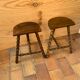 Paire de tabourets tripodes