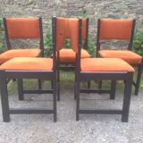 Series of 6 vintage chairs in orange fabric and black lace-up.
