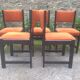 Series of 6 vintage chairs in orange fabric and black lace-up.