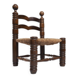 Low woven straw chair in the manner of Charles Dudouyt, 1940s