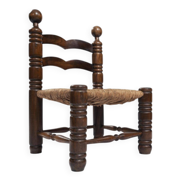 Low woven straw chair in the manner of Charles Dudouyt, 1940s