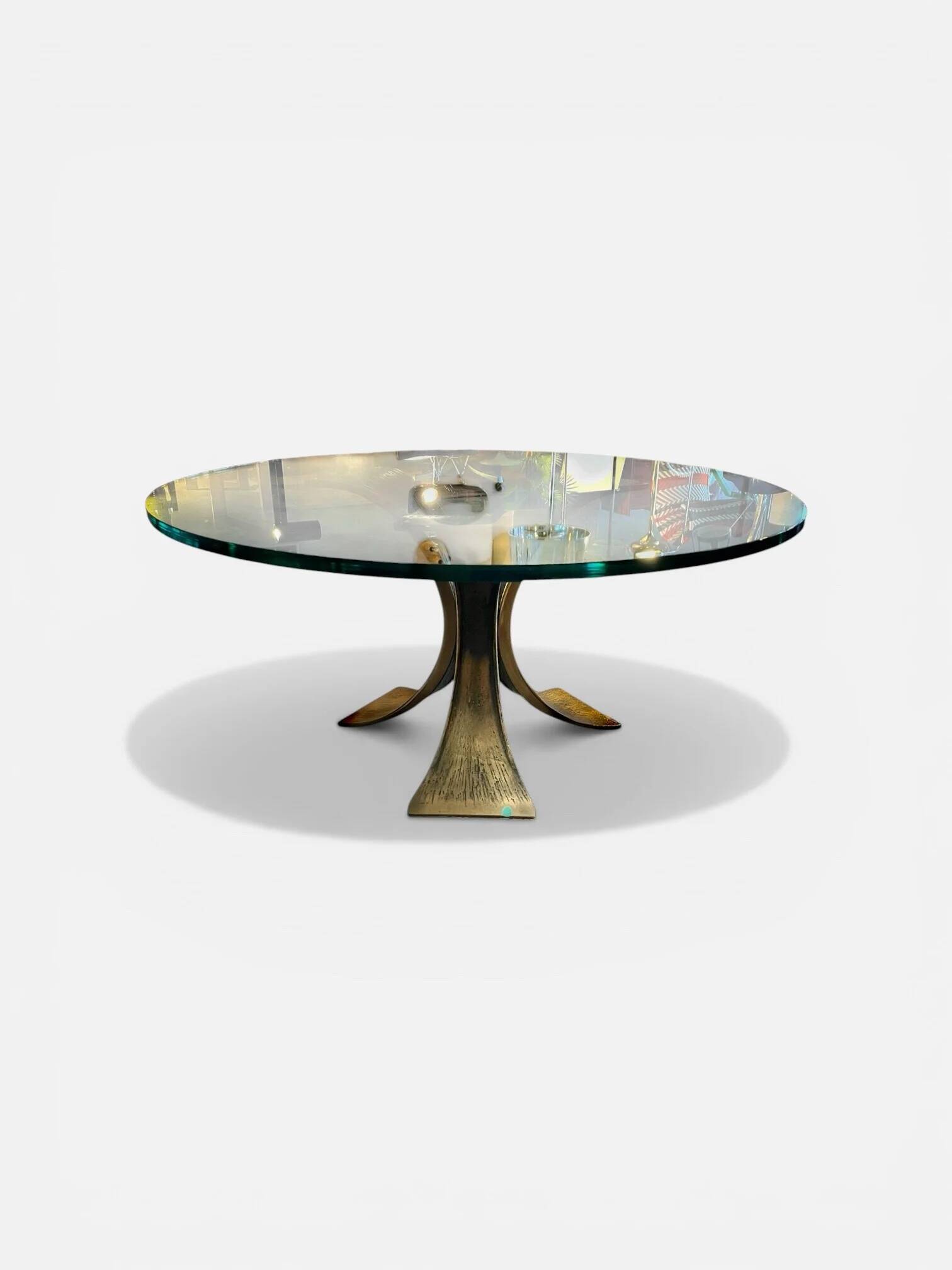 Coffee table in bronze with glass top by Luciano Frigerio