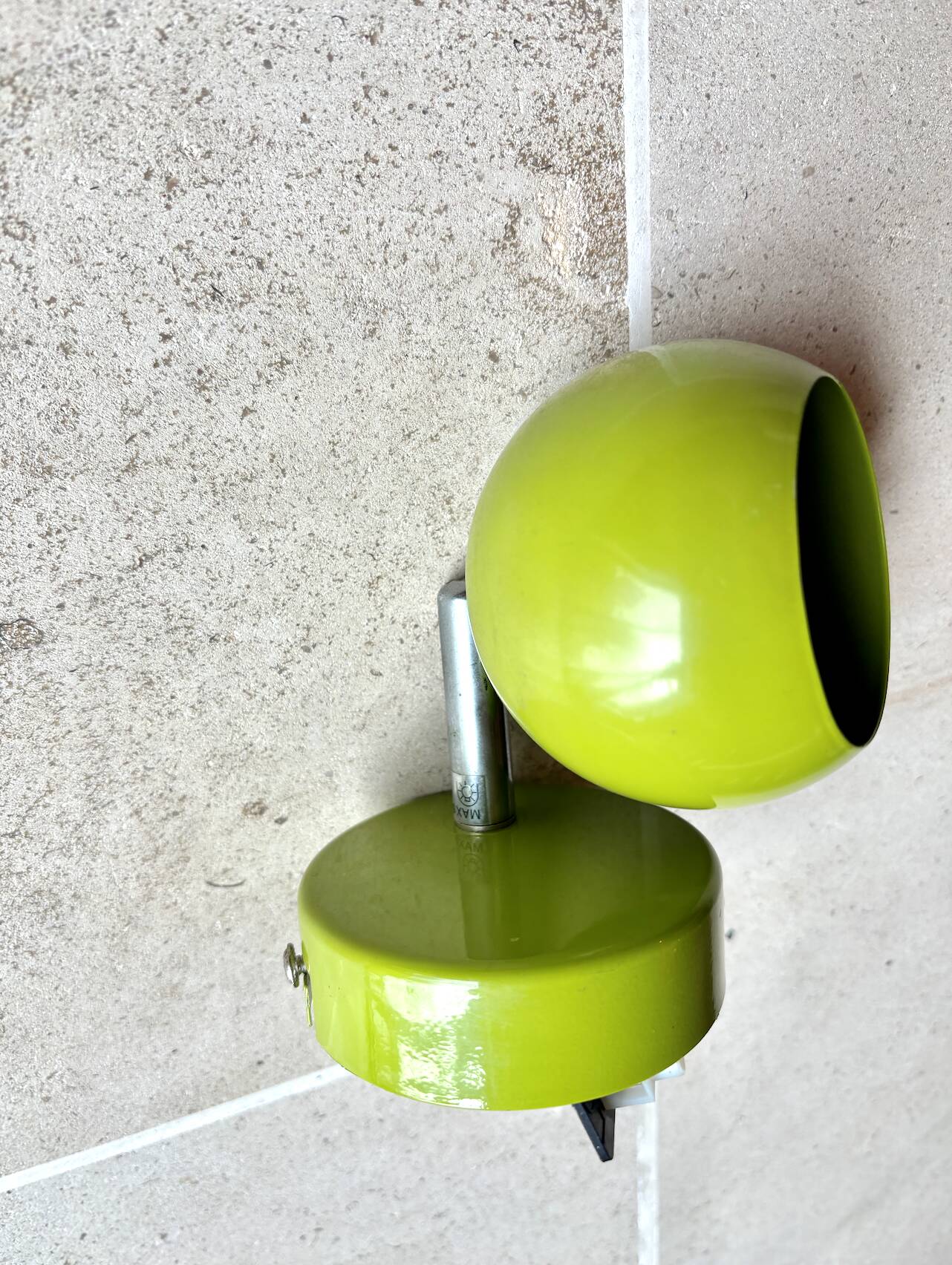 Small vintage metal spotlight in anis green/khaki color.