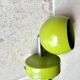 Small vintage metal spotlight in anis green/khaki color.
