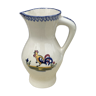 Pitcher decorated with in earthenware of St Clement