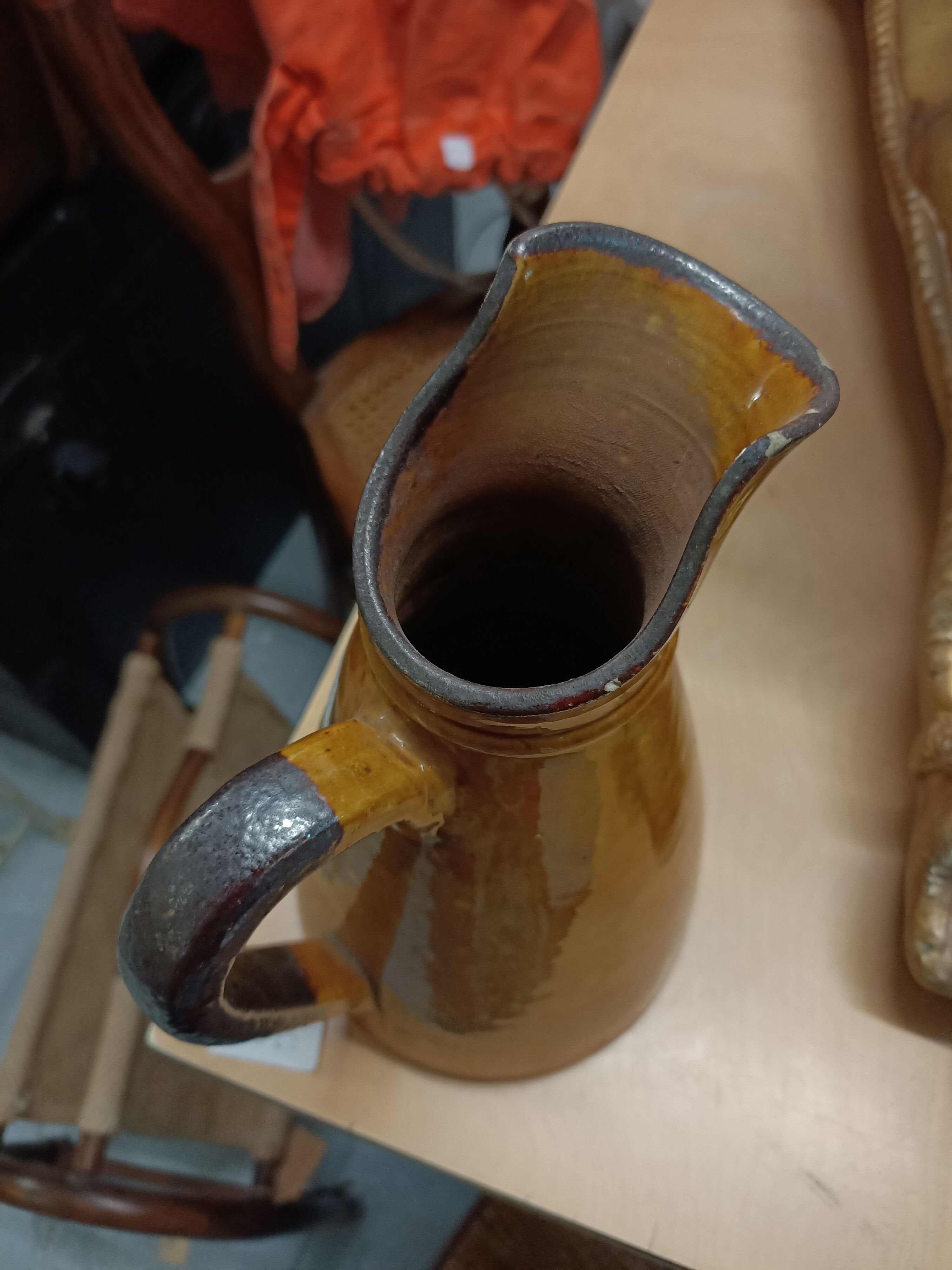 Enamelled terracotta jug