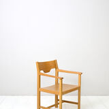 Wooden chair with armrests