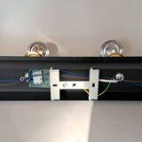 Applique 4 lumières orientables en métal noir et douilles en laiton doré
