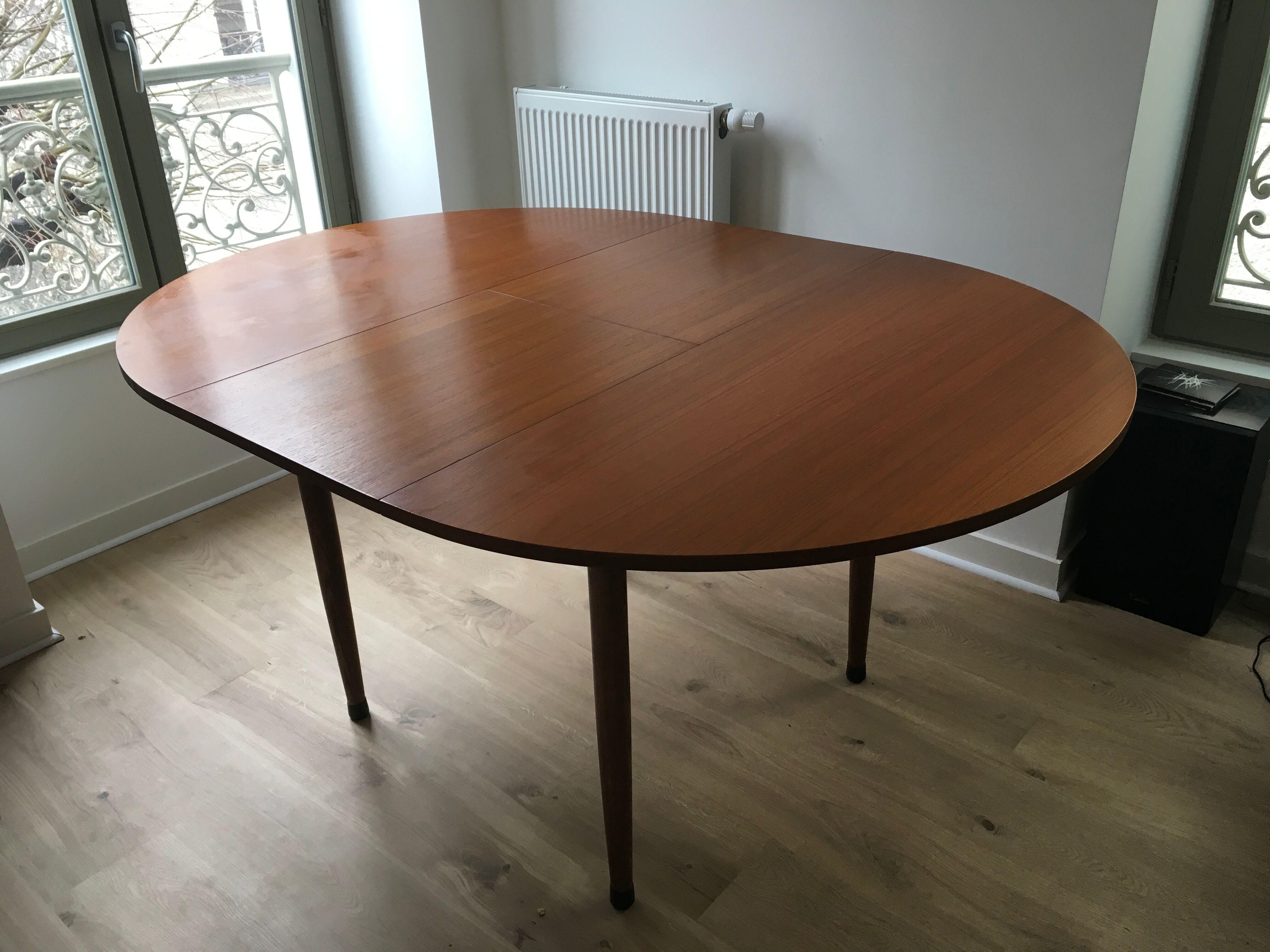 Extended round table in teak 60s