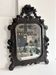 Napoleon III mirror in carved blackened wood, 19th century