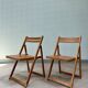 Paire de chaises pliantes en bois 70s