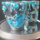 Milk jug and ceramic cup Cyclope Émaux des Glaciers Charles Cart
