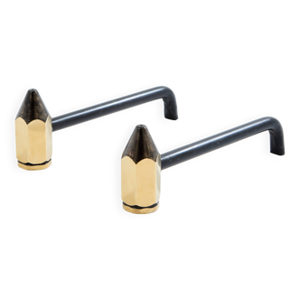 Pair of pencil andirons in brass and wrought iron circa 1960