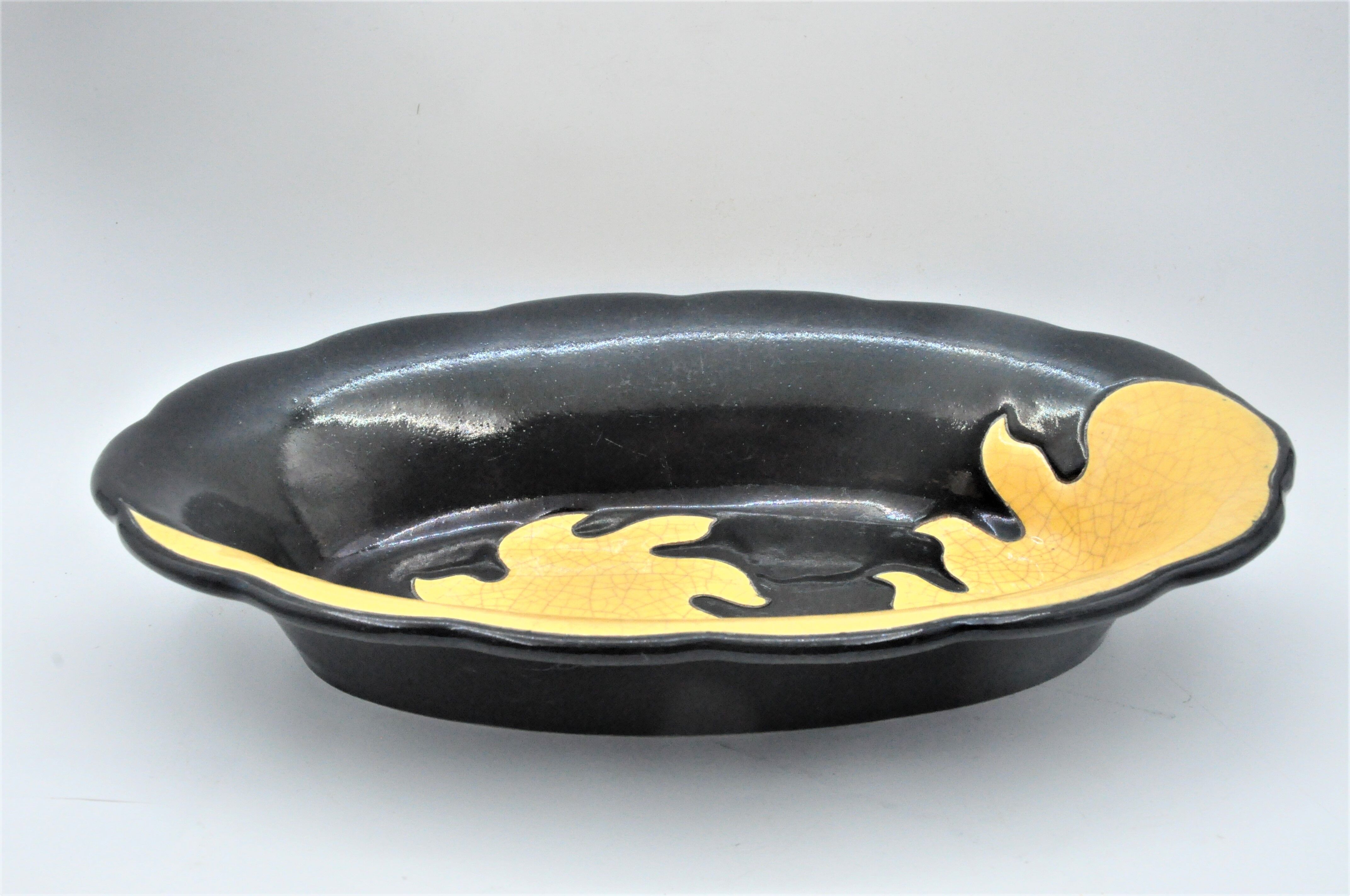 Old dish in enamels from longwy ombre et lumière collection ceramic design