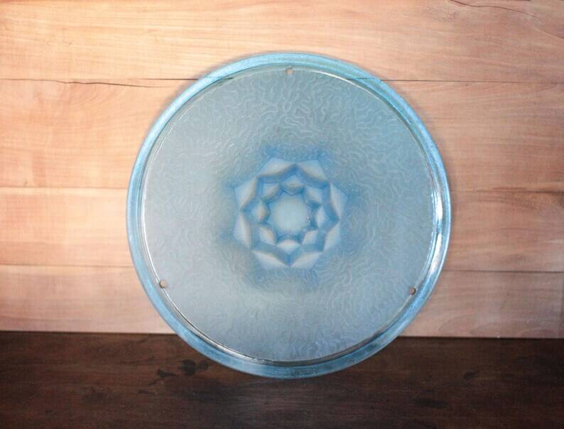 Vintage Art Deco ceiling light, suspension bowl with geometric patterns, blue dish, interior decor.