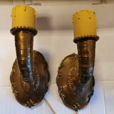A set of wall lamps in solid brass