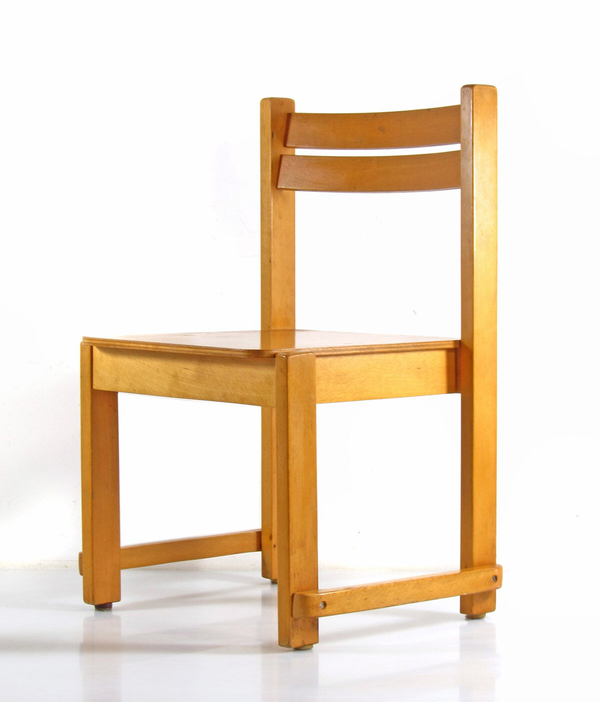 Children's chair in plywood in Scandinavian Danish style.