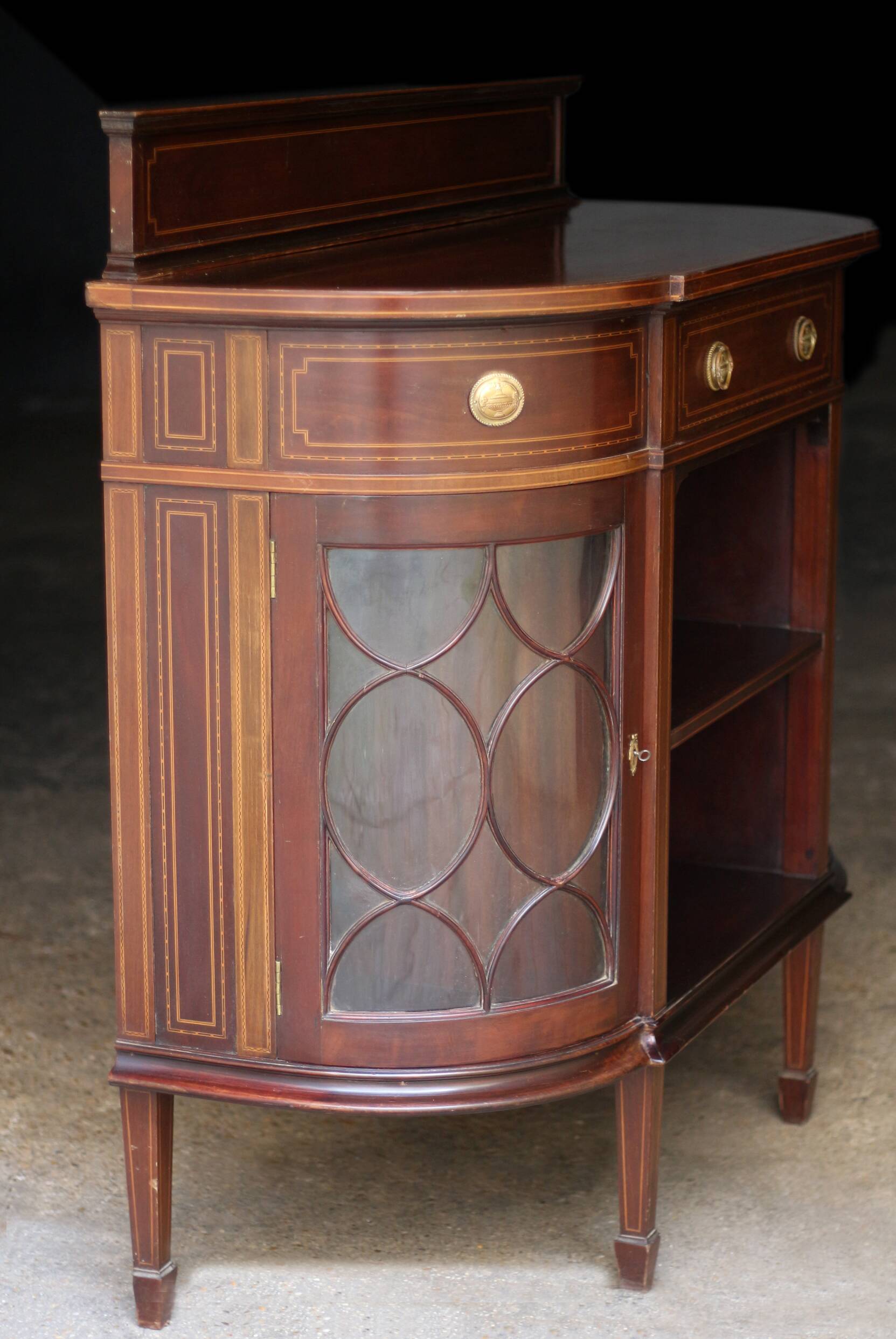 Elegant console by waring & gillow ltd, in mahogany veneer.