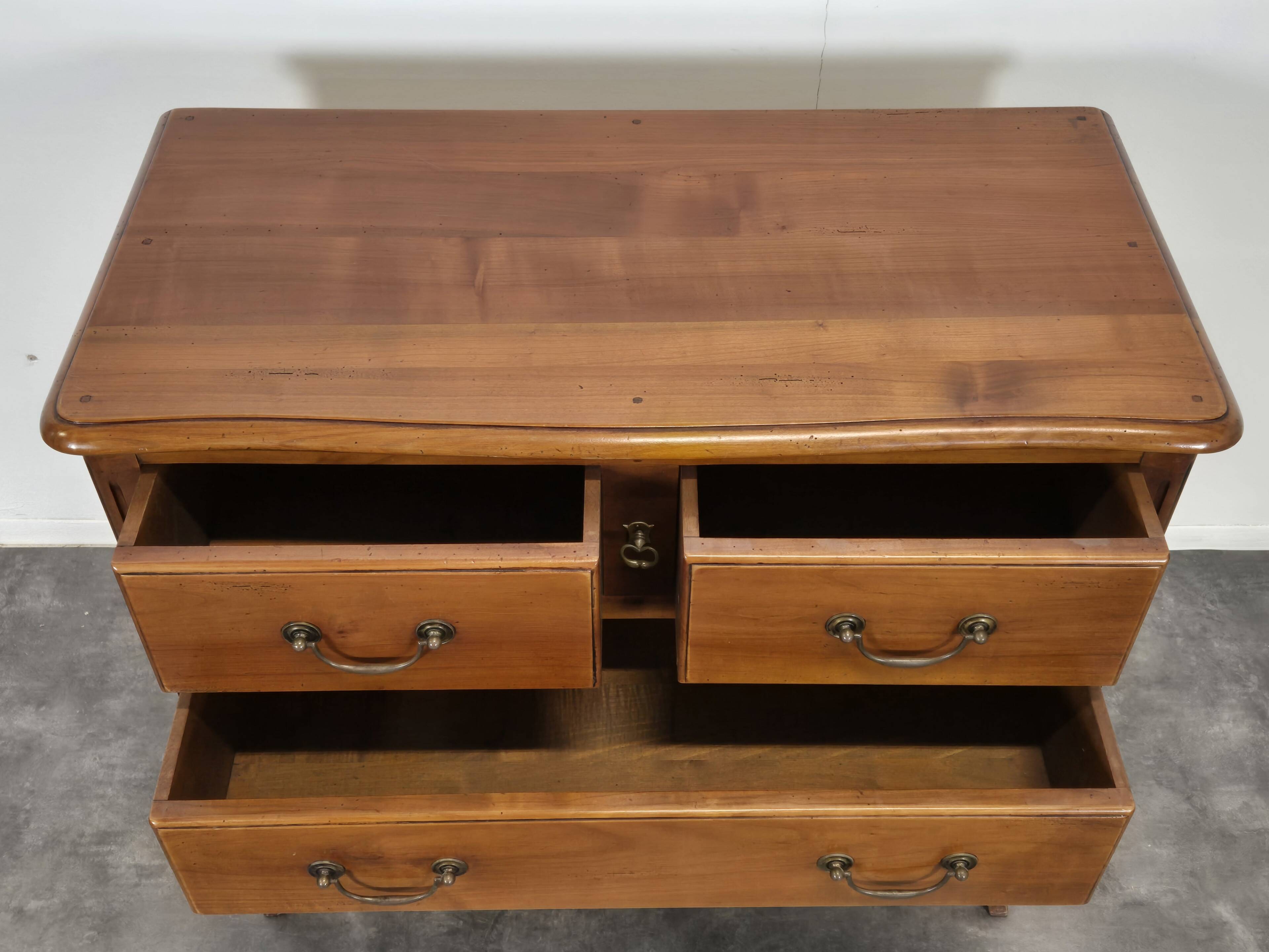 Transitional style chest of drawers in cherry wood