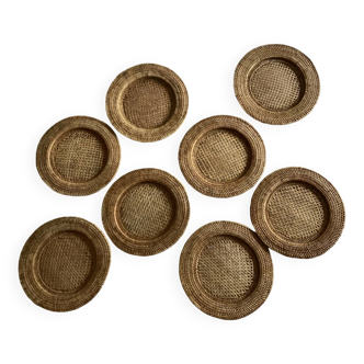 Set of round woven rattan and canework coasters