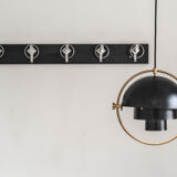 Hang wall clothes, Italy 70s.