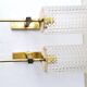 Pair of brass metal and glass sconces 1960