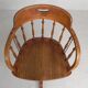 Oak office chair with a spring system and height adjustable, 1930s.