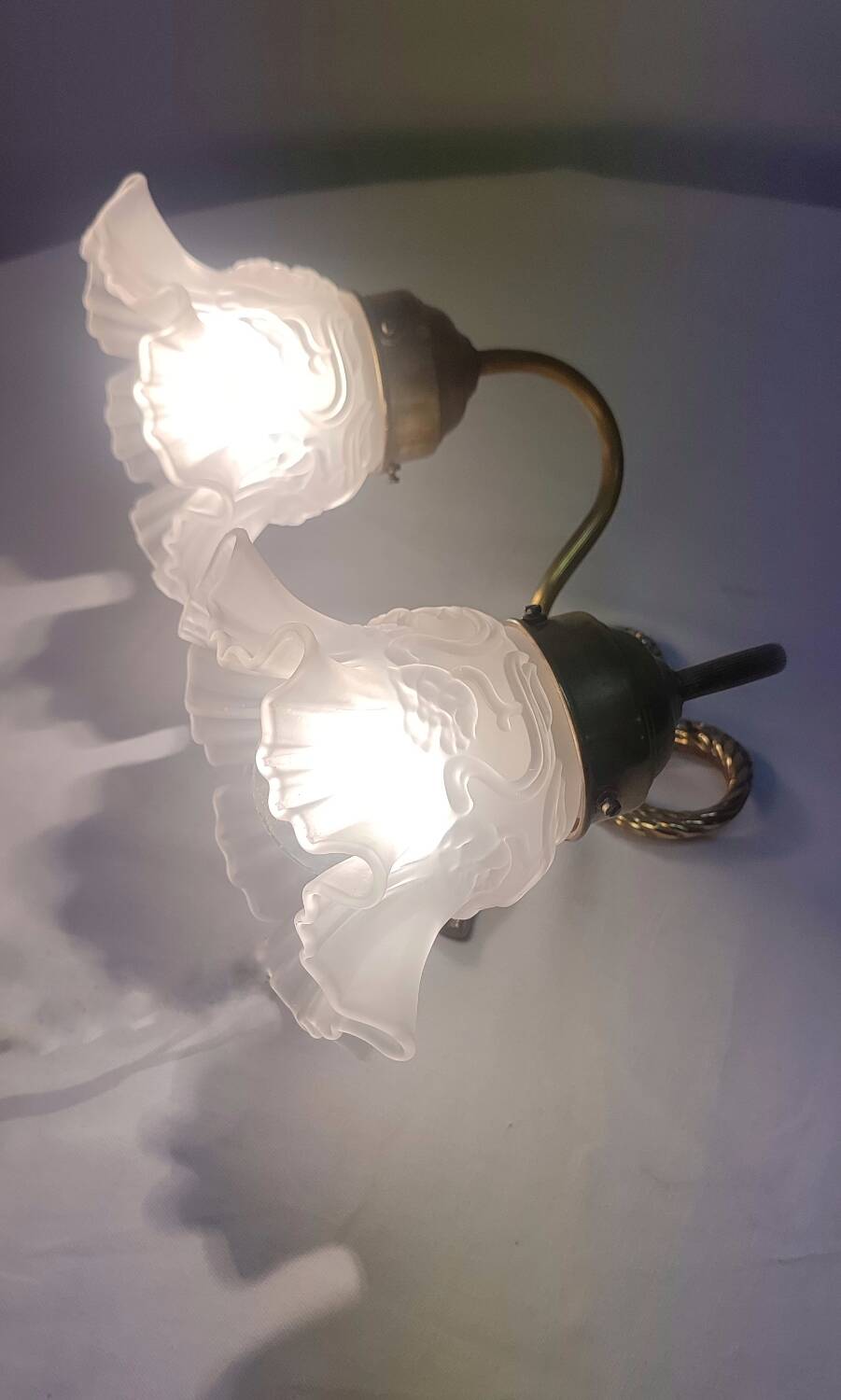 Bronze and crystal wall light. France, 1950s.