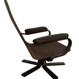 Scandinavian tilting and swivel armchair in curved wood and leather
