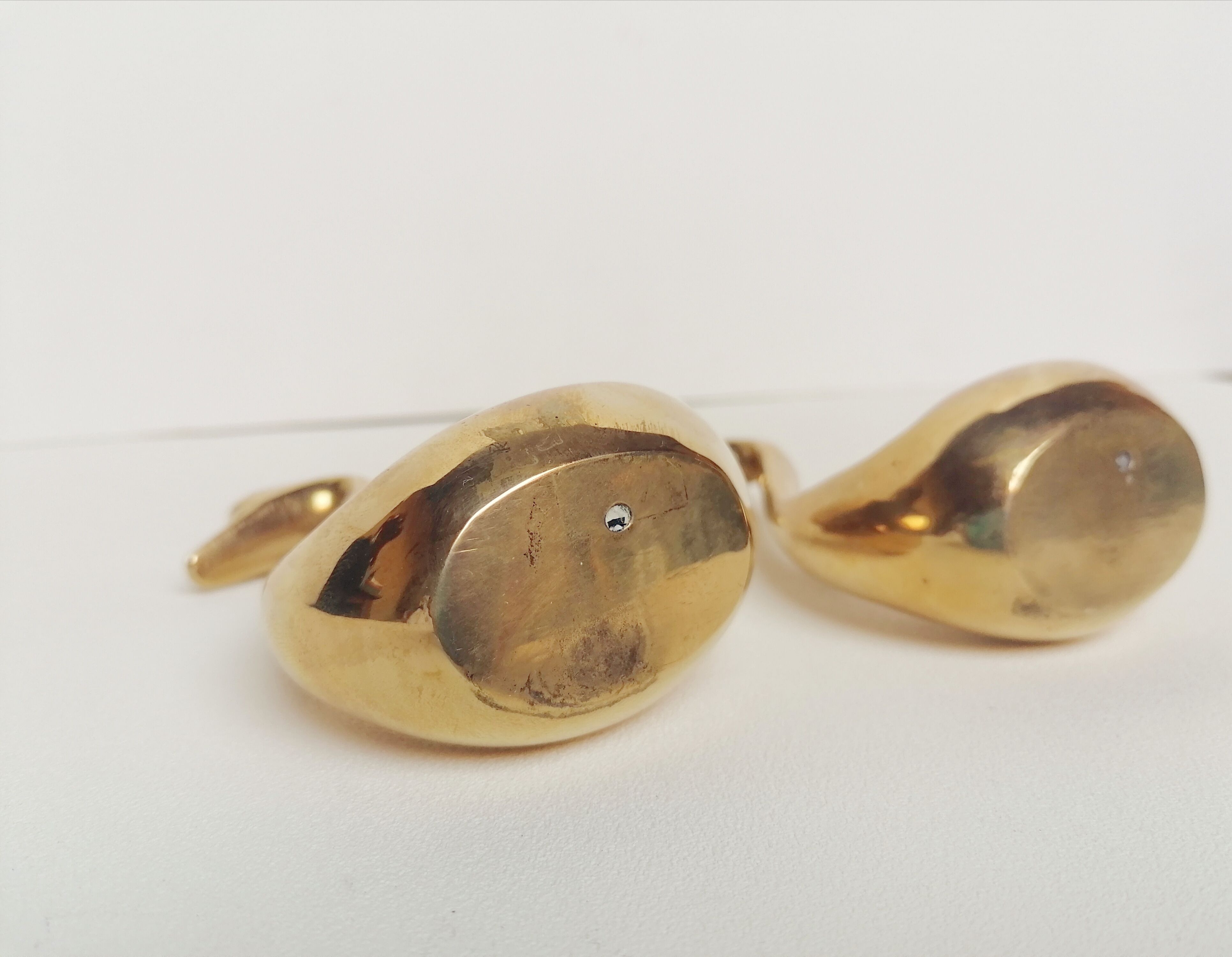 Two ducks made of solid brass