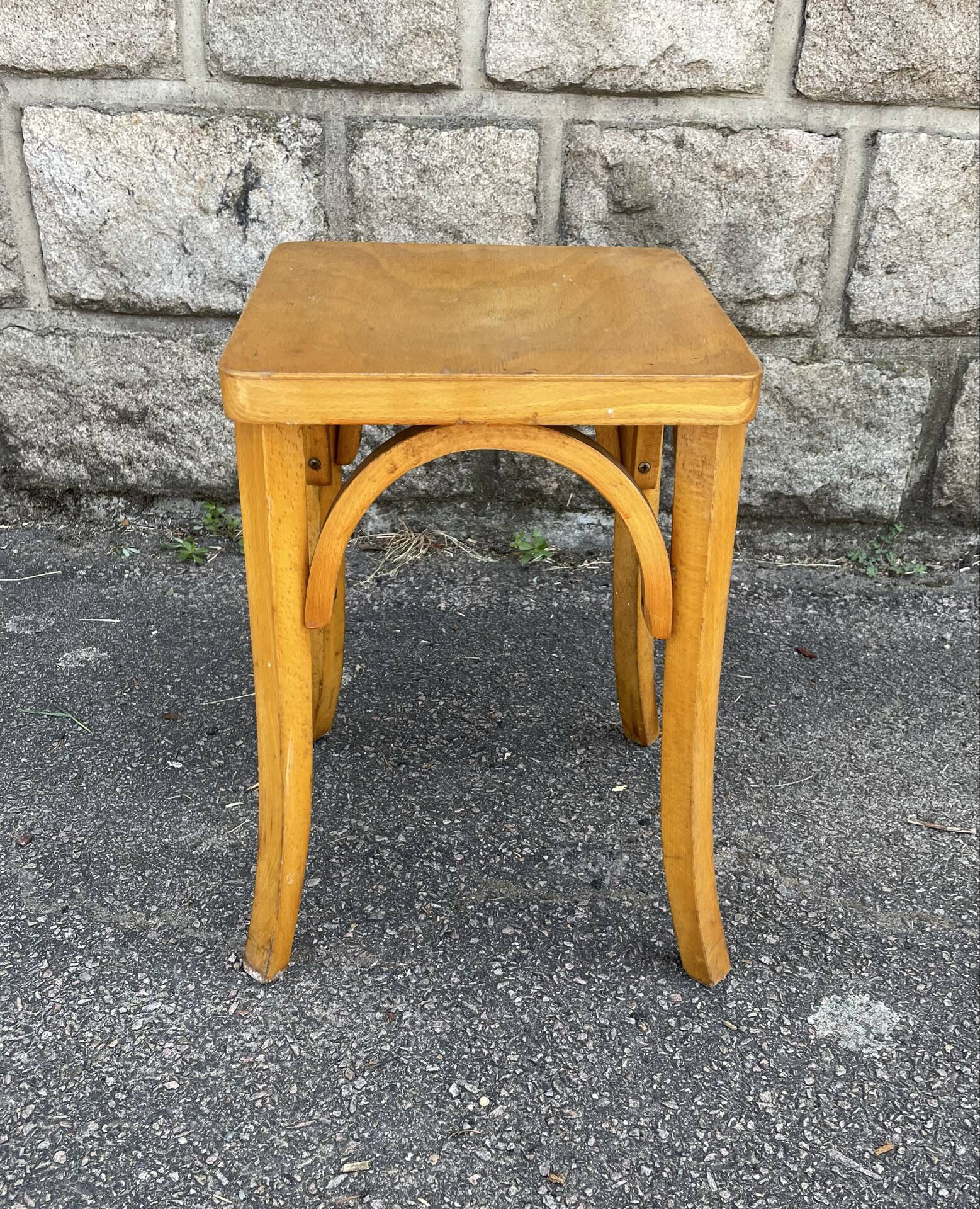 Curved wood stool in Baumann style