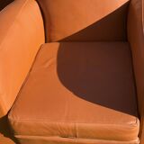 pair of leather clubs