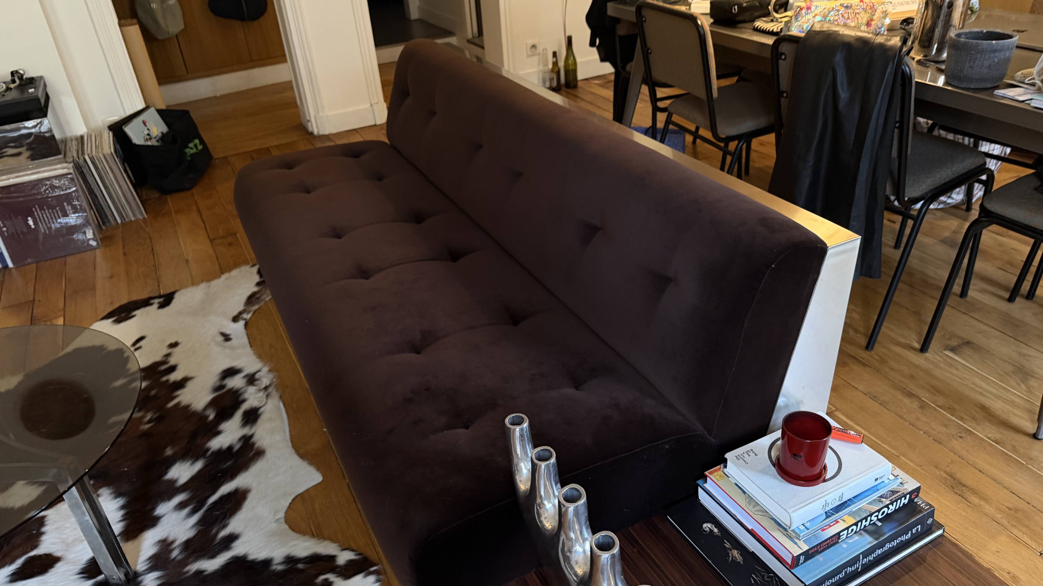 Red Edition Stanley 3-seater sofa with matching chocolate velvet storage.
