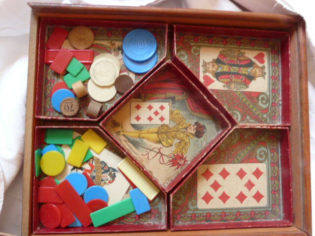 Ancient game of yellow wooden dwarf with pawns