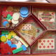 Ancient game of yellow wooden dwarf with pawns