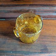 Small vase or amber bubbled glass tealight holder